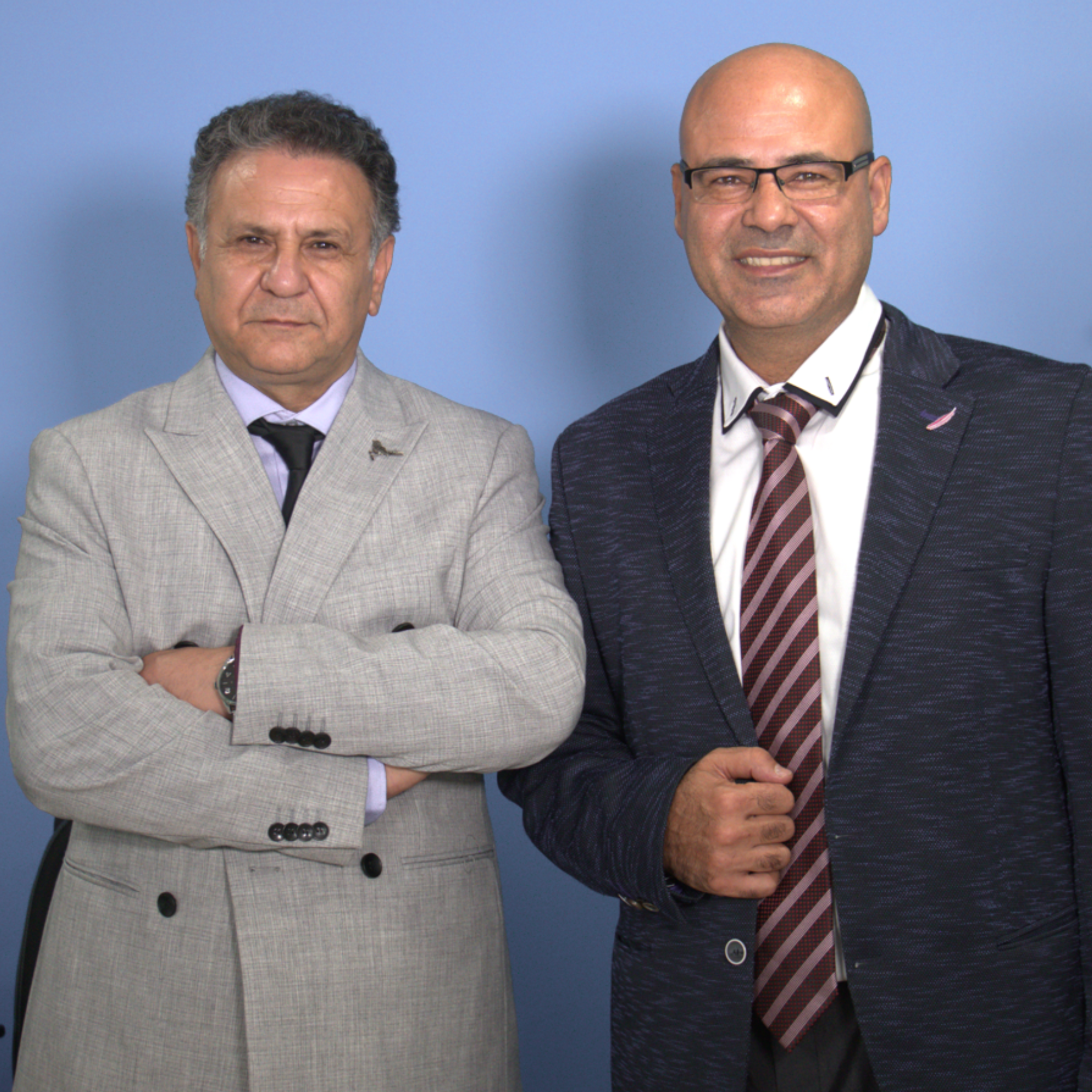 Image of Arman Eren and Matthew Rostami standing side by side.